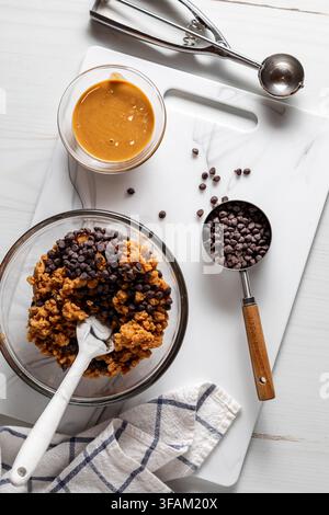 Fresh ingredients for making peanut butter and chocolate chip energy balls. Stock Photo