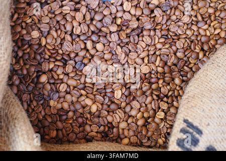 Coffee beans in a burlap sack Stock Photo
