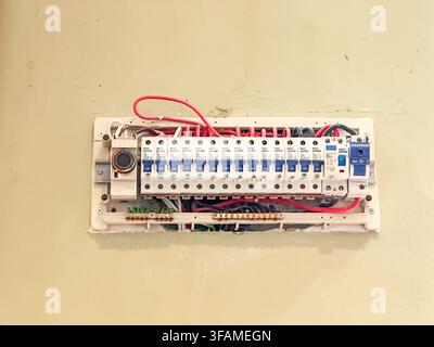 Johor, Malaysia, August 18, 2026: A close-up view of a household electrical distribution board with circuit breakers, wiring, and a main switch mounte Stock Photo