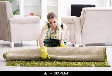 The professional cleaner who cleans carpets Stock Photo