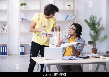 The two male students in the classroom Stock Photo