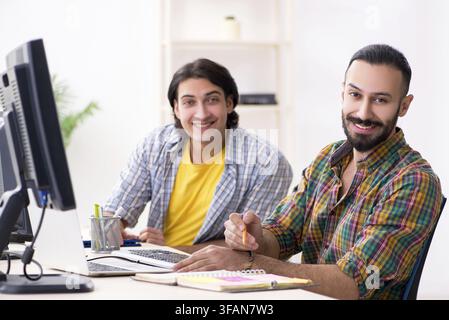 The two IT specialists who work in the office Stock Photo
