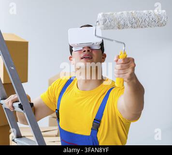 Painter, contractor working with virtual reality glasses Stock Photo