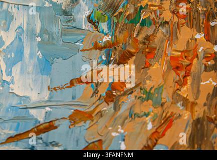 Vibrant abstract paint texture with thick layered strokes across an artist palette Stock Photo