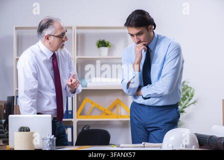 Two architects are working on the project Stock Photo