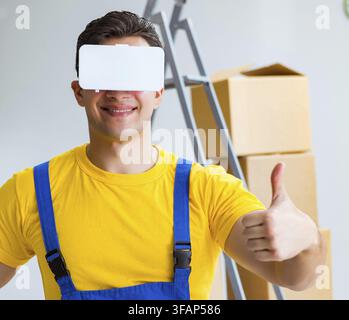 Painter, contractor working with virtual reality glasses Stock Photo