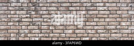 Panorama wall made of rectangular stones with abstract brown white pattern Stock Photo