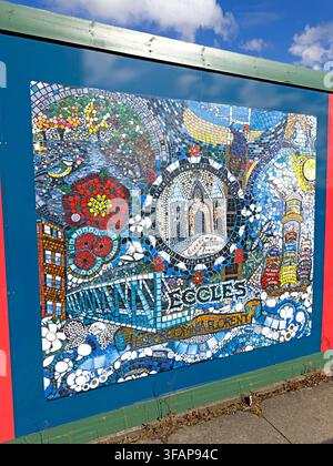 Greetings From Eccles community artwork on We Love Eccles regeneration hoardings in Eccles town centre, Salford, August 2026. Stock Photo