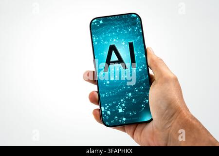 Hand holding smartphone with AI technology concept on screen Stock Photo