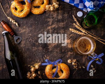 Traditional bavarian brezel and beer, Oktoberfest food concept Stock Photo