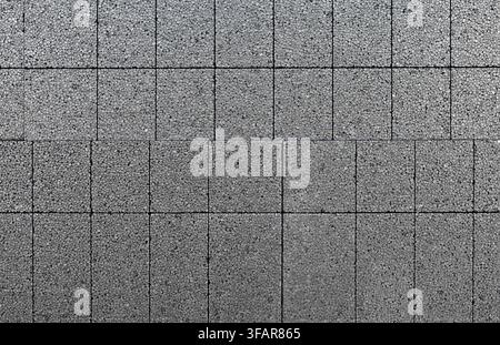 Gray expanded polystyrene insulation panels for exterior wall. It is used to improve energy efficiency. Close up. Background and texture. Stock Photo