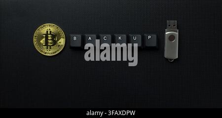 Bitcoin Backup Security Concept With USB Drive And Keyboard Keys Stock Photo