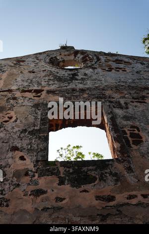 Close Up of Weathered Ancient Church Ruin Wall Empty Stone Window Opening Stock Photo