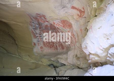 Red and black Chumash pictographs painted on sandstone inside Chumash Painted Cave State Historic Park above Santa Barbara, California. Stock Photo