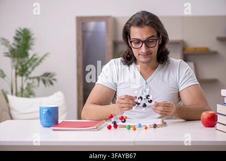 Young student preparing for exams at home Stock Photo