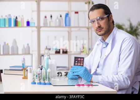 Young chemist working in laboratory Stock Photo