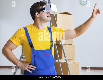 Painter, contractor working with virtual reality glasses Stock Photo