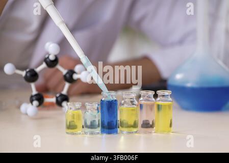 Young chemist working in laboratory Stock Photo