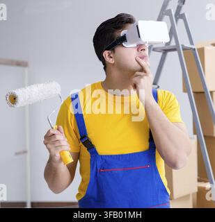 Painter, contractor working with virtual reality glasses Stock Photo