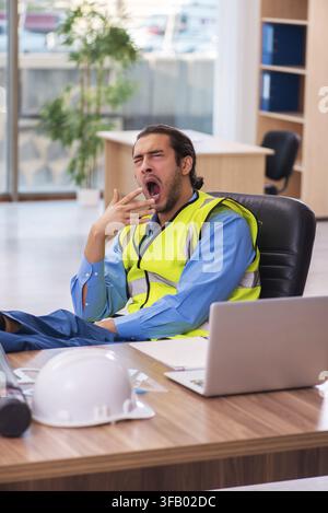 Young architect working in office Stock Photo