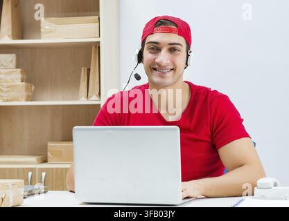 Call center employees in the parcel distribution center in the post office Stock Photo
