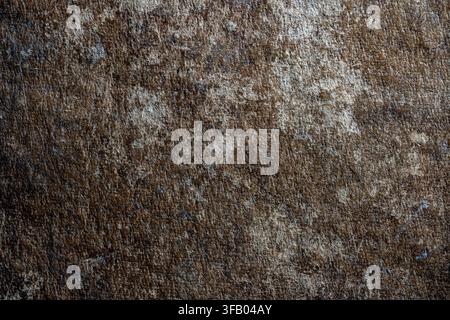 Vintage grunge abstract brown background. Dark brown abstract grunge texture with worn paper look and rough fibrous surface details, perfect for retro Stock Photo