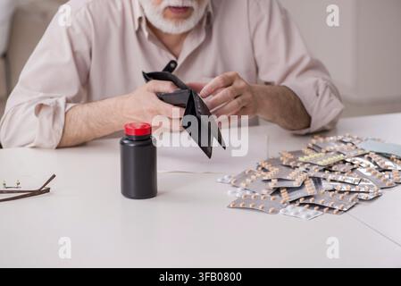 Old man is suffering at home Stock Photo