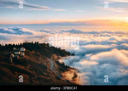 Sunset landscape in Georgia aerial view road in Caucasus mountains and clouds in Georgia, explore Guria region nature summer season Gomis Mta evening Stock Photo