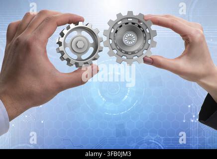 The businessman in a teamwork concept with gears Stock Photo