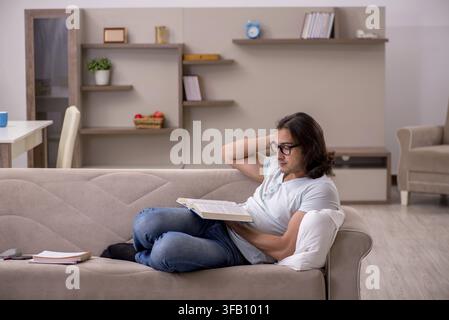 Young student preparing for exams at home Stock Photo