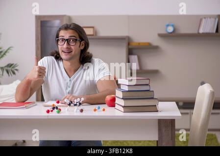 Young student preparing for exams at home Stock Photo
