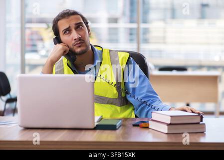 Young architect working in office Stock Photo