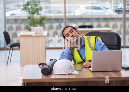 Young architect working in office Stock Photo