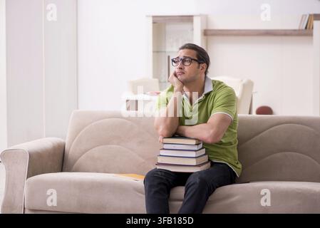 Young student preparing for exams at home Stock Photo