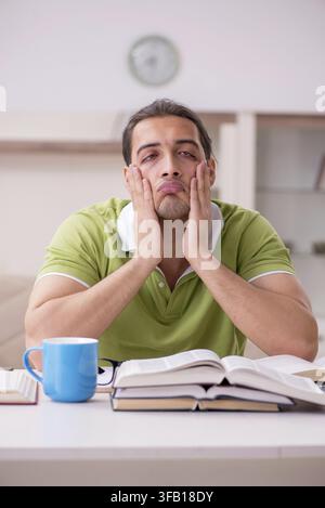 Young student preparing for exams at home Stock Photo