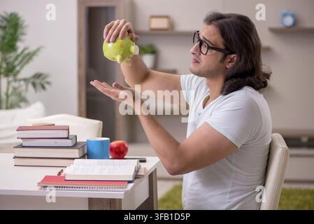 Young student preparing for exams at home Stock Photo