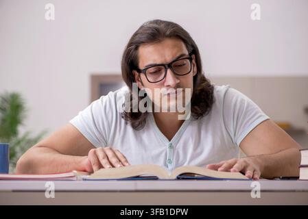 Young student preparing for exams at home Stock Photo