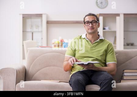 Young student preparing for exams at home Stock Photo