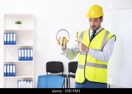 Young architect in presentation concept Stock Photo