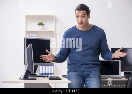 Young IT specialist working in an office Stock Photo