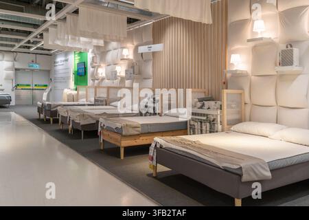 Kuala Lumpur, Malaysia - August 21,2026 : IKEA showroom interior featuring a spacious bedding and bedroom furniture section with beds, mattresses, pil Stock Photo