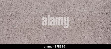 Close up of a smooth asphalt pavement showing its grainy texture Stock Photo