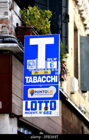 Blue and white Tabacchi sign commonly found outside authorized tobacco and lottery shops in Italy Stock Photo