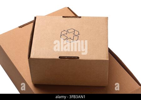 Stack of Recyclable Brown Cardboard Shipping Boxes with Recycling Symbol Stock Photo