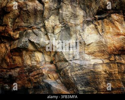 Close up view of natural stone cliff surface Stock Photo