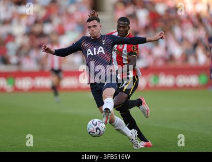 Andrew Robertson of Tottenham Hotspur under pressure from Jay Dasilva ...