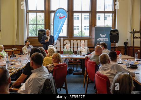 Berlin, Berlin, Germany. 22nd Aug, 2026. An AfD speaker addresses the audience while Beatrix von Storch sits at the panel during a public forum at Charlottenburg Town Hall in Berlin, Germany, on Saturday, August 22, 2026. Banners for the AfD and Generation Deutschland Berlin, the local branch of the party youth organization, frame the panel. (Credit Image: © Michael Kuenne/PRESSCOV via ZUMA Press Wire) EDITORIAL USAGE ONLY! Not for Commercial USAGE! Stock Photo
