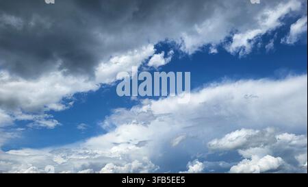 Dramatic Cloud Formation Against a Deep Blue Sky in Switzerland Stock Photo