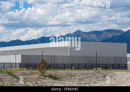 Eagle Mountain, Utah, USA. 22nd Aug, 2026. A large-scale industrial facility building stands on the Meta Eagle Mountain Data Center campus in Eagle Mountain, Utah, United States, on August 21, 2026. The massive technological infrastructure campus comprises multiple structures built to house computing servers and manage global data processing networks for Facebook's parent company, Meta Platforms, Inc. (Credit Image: © Charles McClintock Wilson/ZUMA Press Wire) EDITORIAL USAGE ONLY! Not for Commercial USAGE! Stock Photo