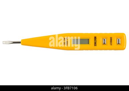 Indicator screwdriver for determining the phase of the electric current. Yellow indicator screwdriver isolated on a white background. Stock Photo